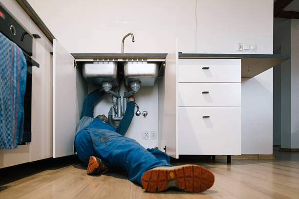 Professional Drain Cleaning technician working in Alton, IL